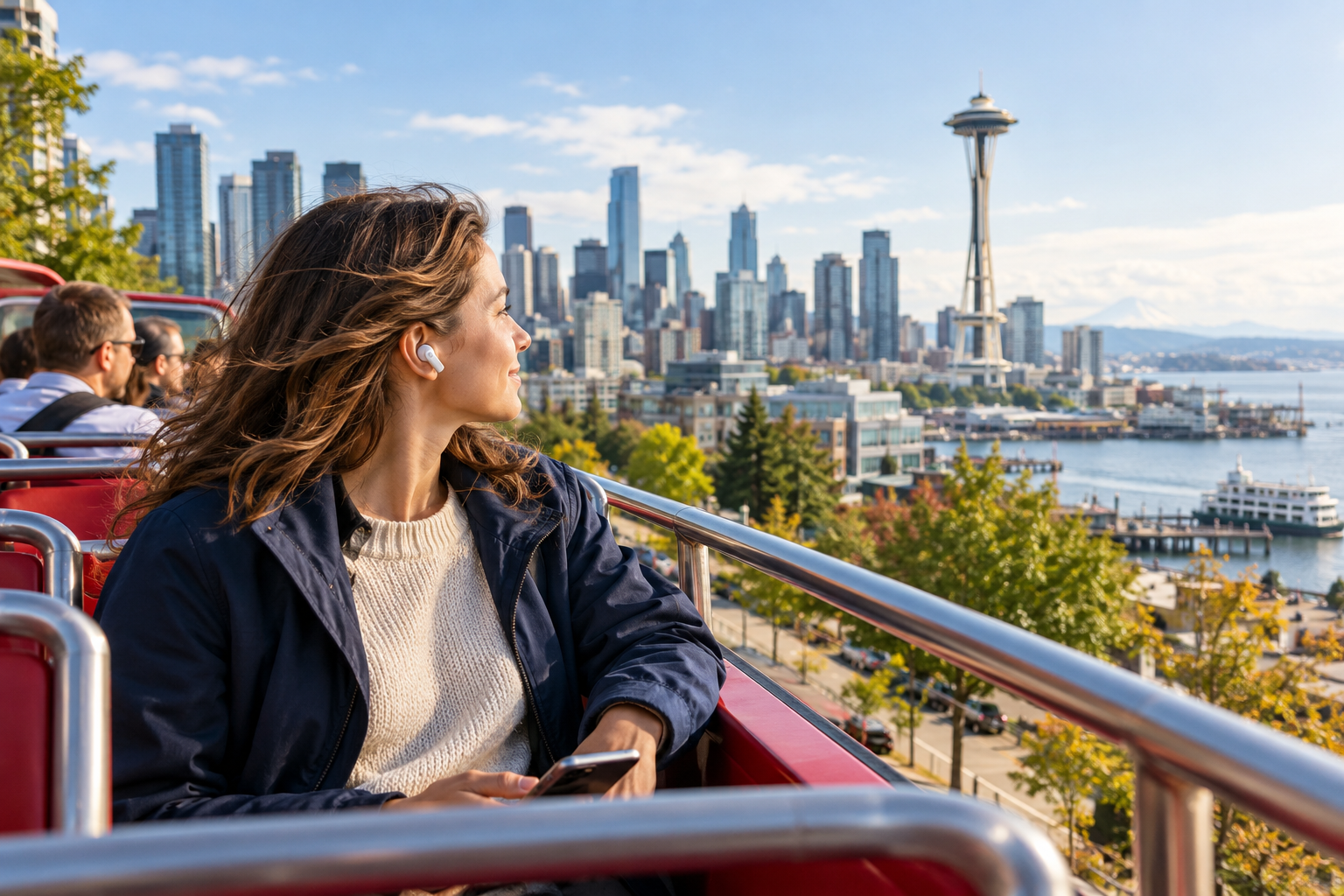 Illustrative passenger listening while looking out at Seattle, with optional landmark imagery on her phone.